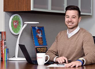 Bel employee in office