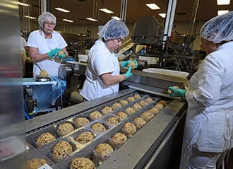 Bel employees working on the factory line