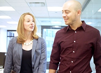 Bel employees walking in office